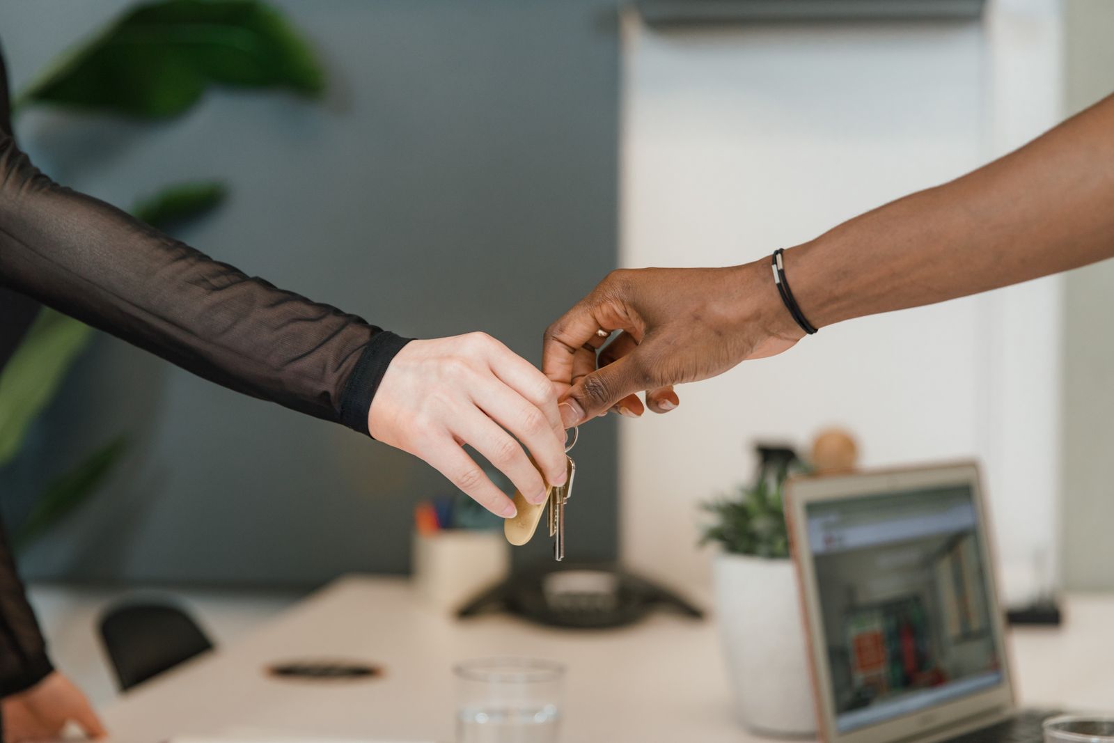 A buyer receives house keys at closing.